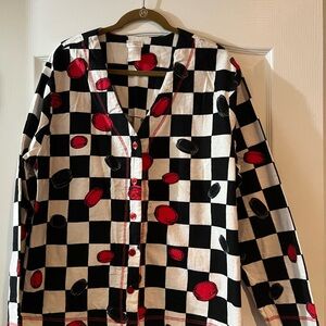 Beautiful pajama set red black and white.  Pants have feet in them